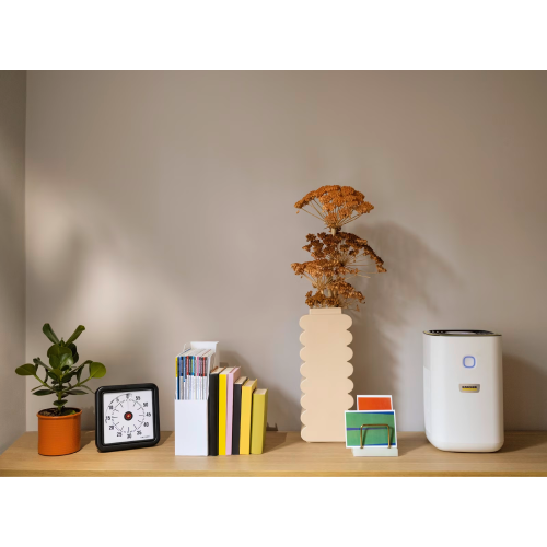 جهاز تنقية الهواء من الدخان والروائح.